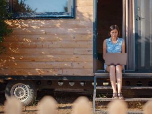 Women working remotely in a tiny house in Tucson
