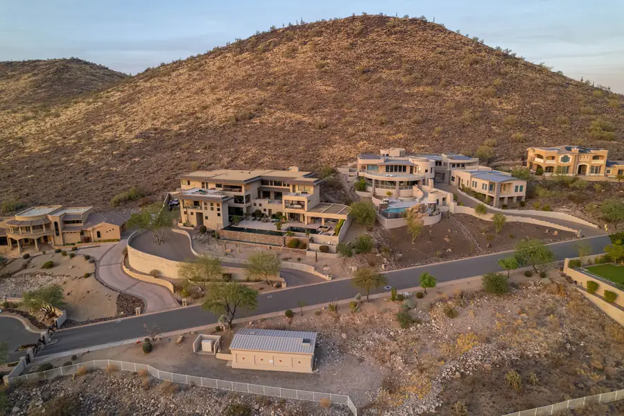 Luxury custom home builders in Arizona completing a modern desert home exterior.