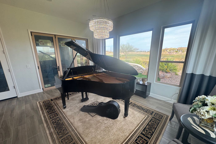 Image of a Luxury Room Addition in Mesa, Arizona, built by CactusNectar LLC with a piano and big windows