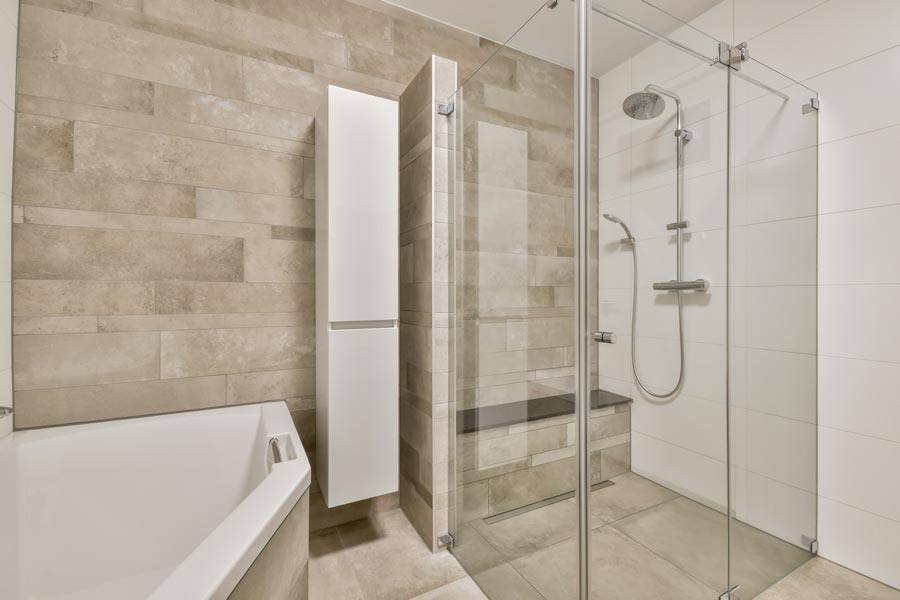 Modern shower with frameless glass in a bathroom remodeled in Phoenix